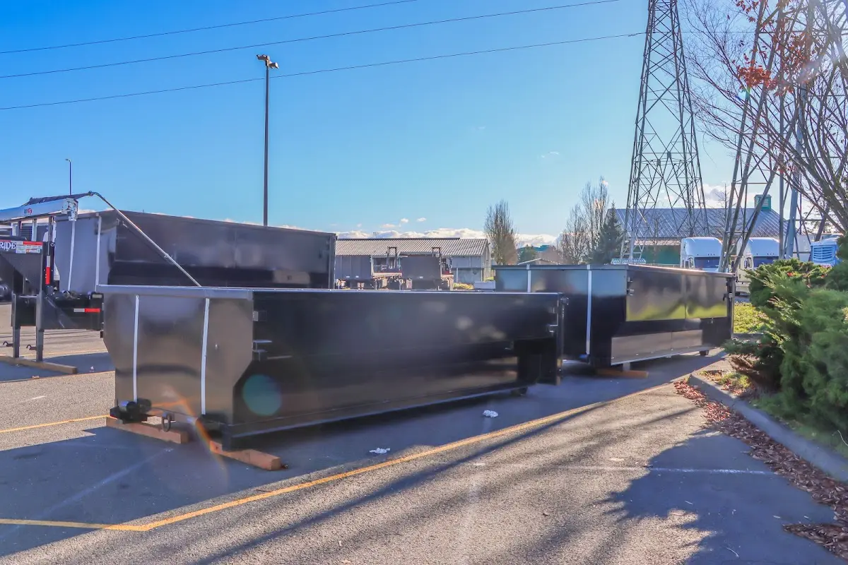 Roll-off dumpster ready for waste disposal at job site for 2 Yard Dumpster Rental in Joshua